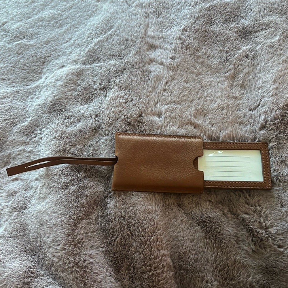 Brown faux leather luggage tag